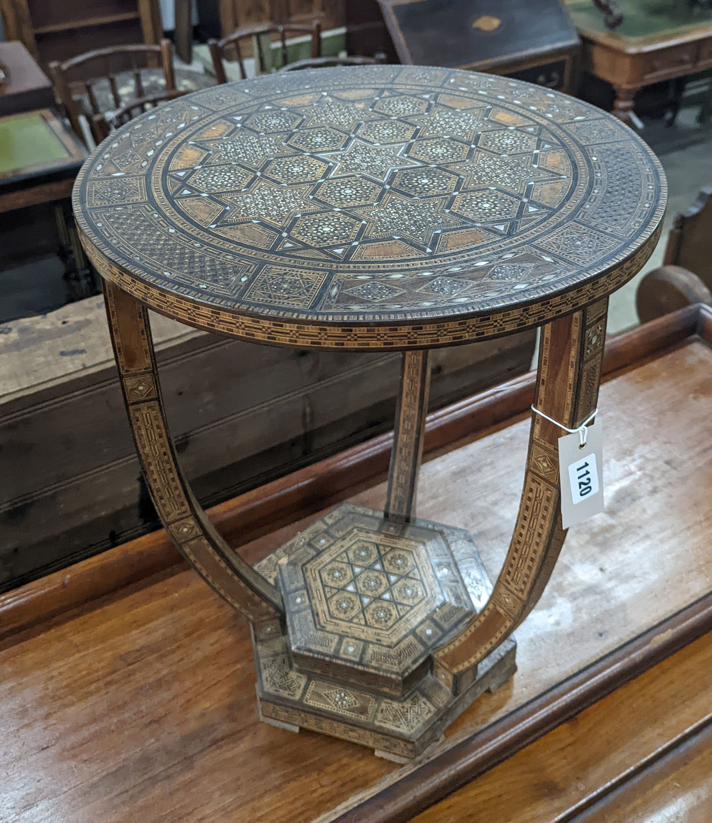 A Moorish bone and parquetry inlaid two tier occasional table, diameter 41cm, height 52cm